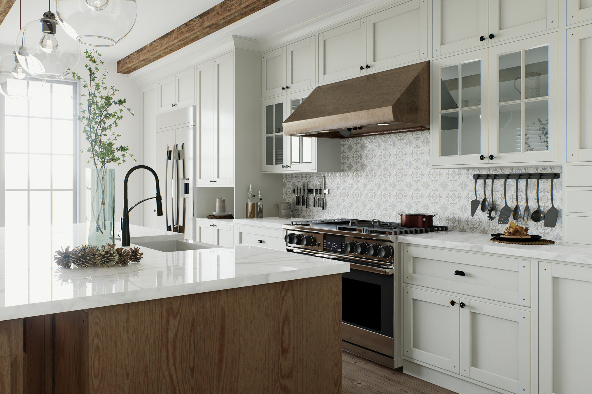 A modern kitchen with a stove, oven, white cupboards, white marble countertops, and an island with a sink.