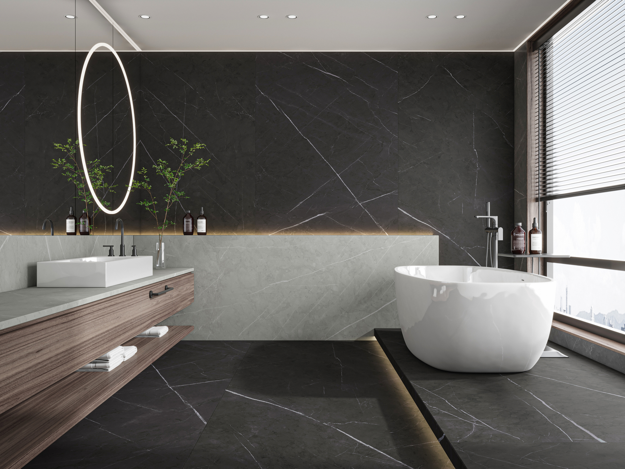 A luxury bathroom vanity with a marble countertop, a white sink, and a mirror above it.