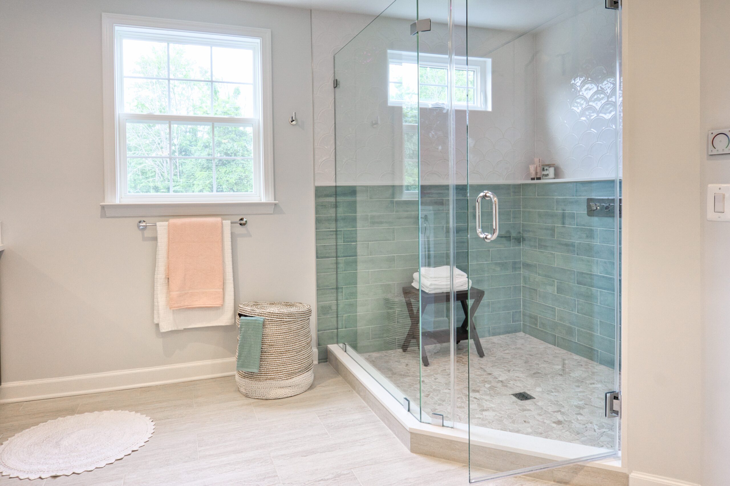 Superior Acrylic Showers In Fullerton, CA | EGM Construction A beautiful shower installed with glass doors next to the tub in the bathroom.