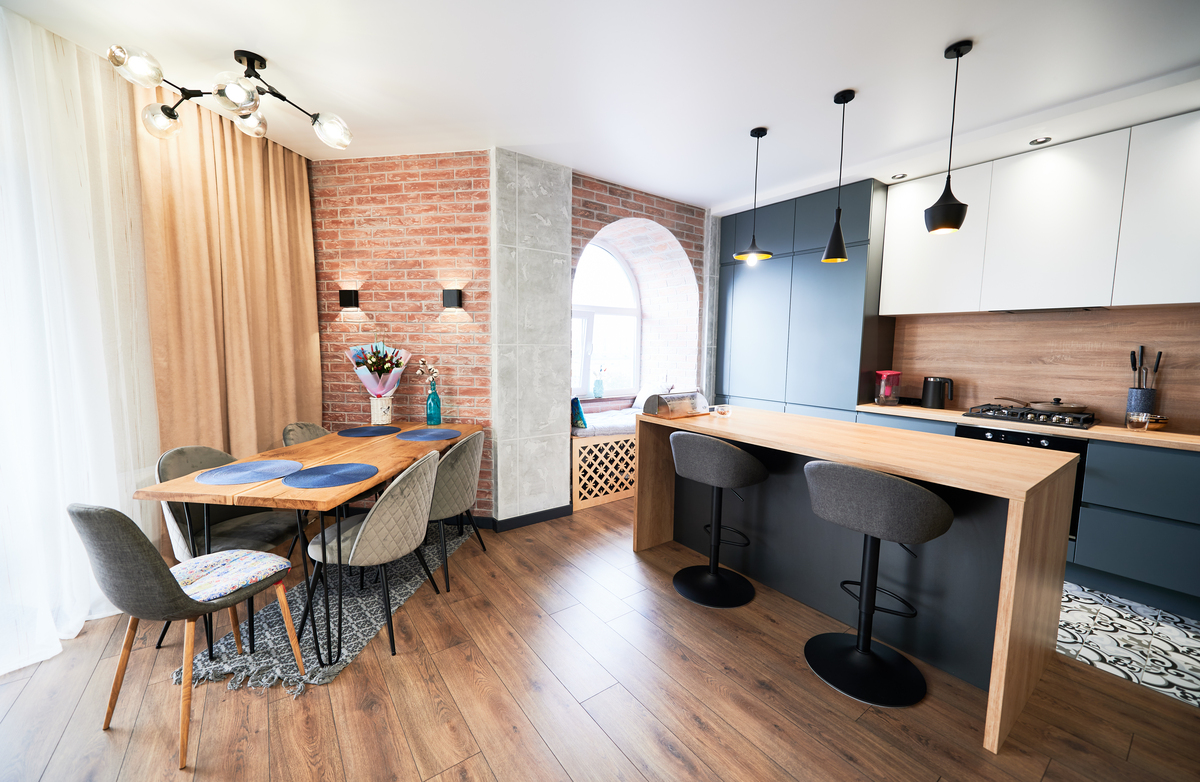A beautifully updated kitchen and adjacent dining area showcase contemporary finishes and thoughtful design following a professional home remodeling project.