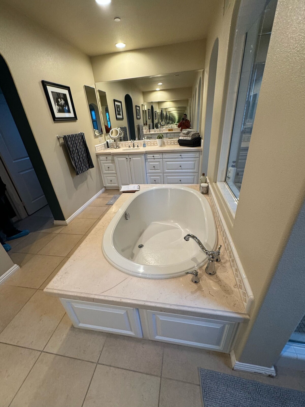 Premium Bathroom Remodeling | San Pedro, CA | EGM Construction A spacious primary bathroom features a large drop-in soaking tub with a tiled surround alongside an expansive vanity area completed during a professional bathroom remodeling project.